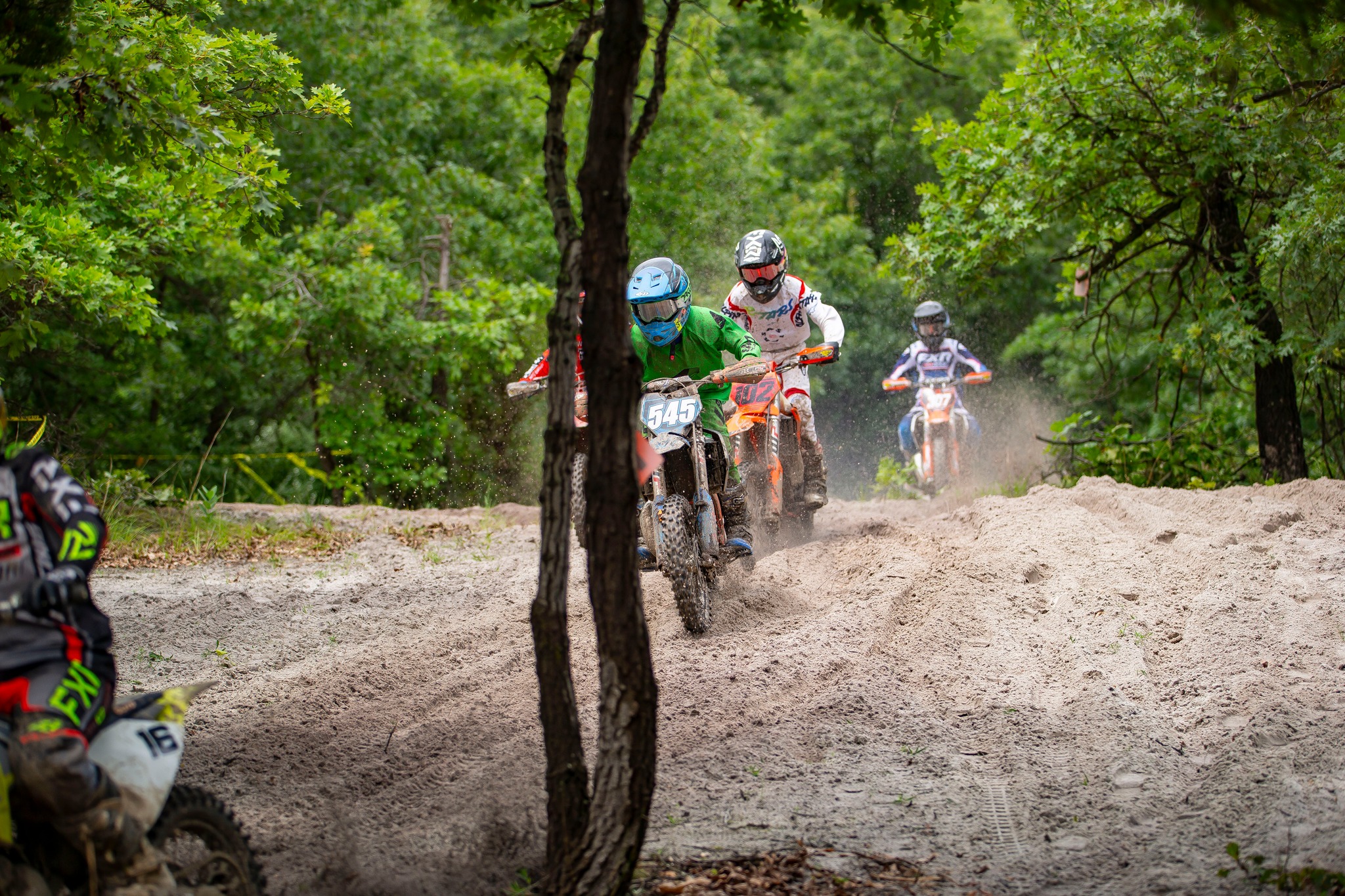 May be an image of 6 people, dirt bike and motorcycle