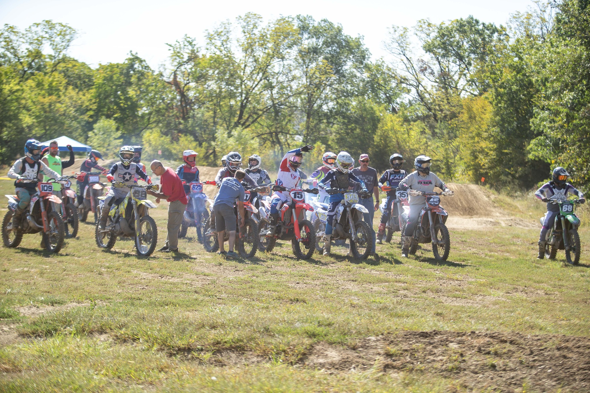 May be an image of 6 people, dirt bike and motorcycle