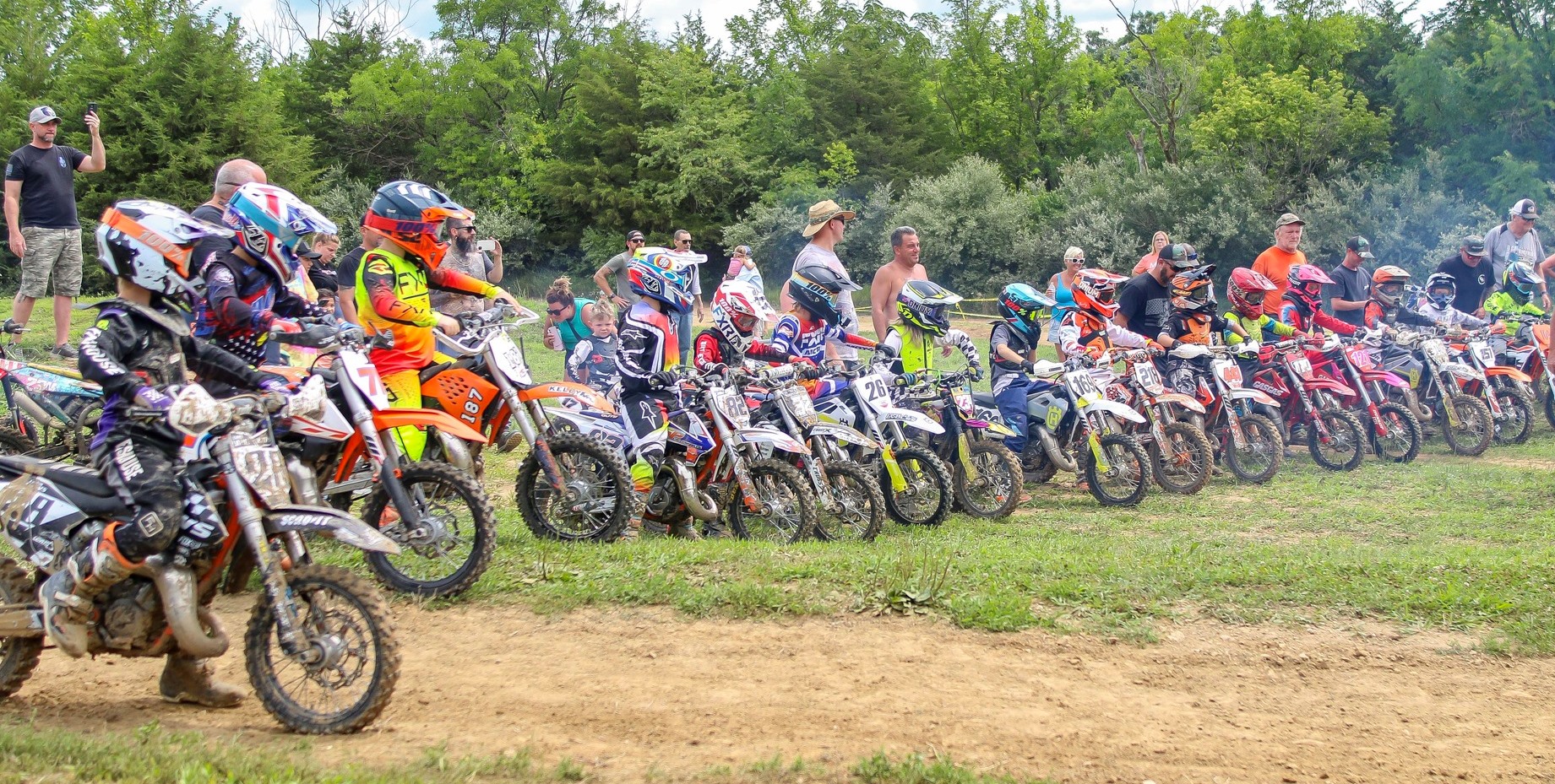 May be an image of 6 people, dirt bike and motorcycle