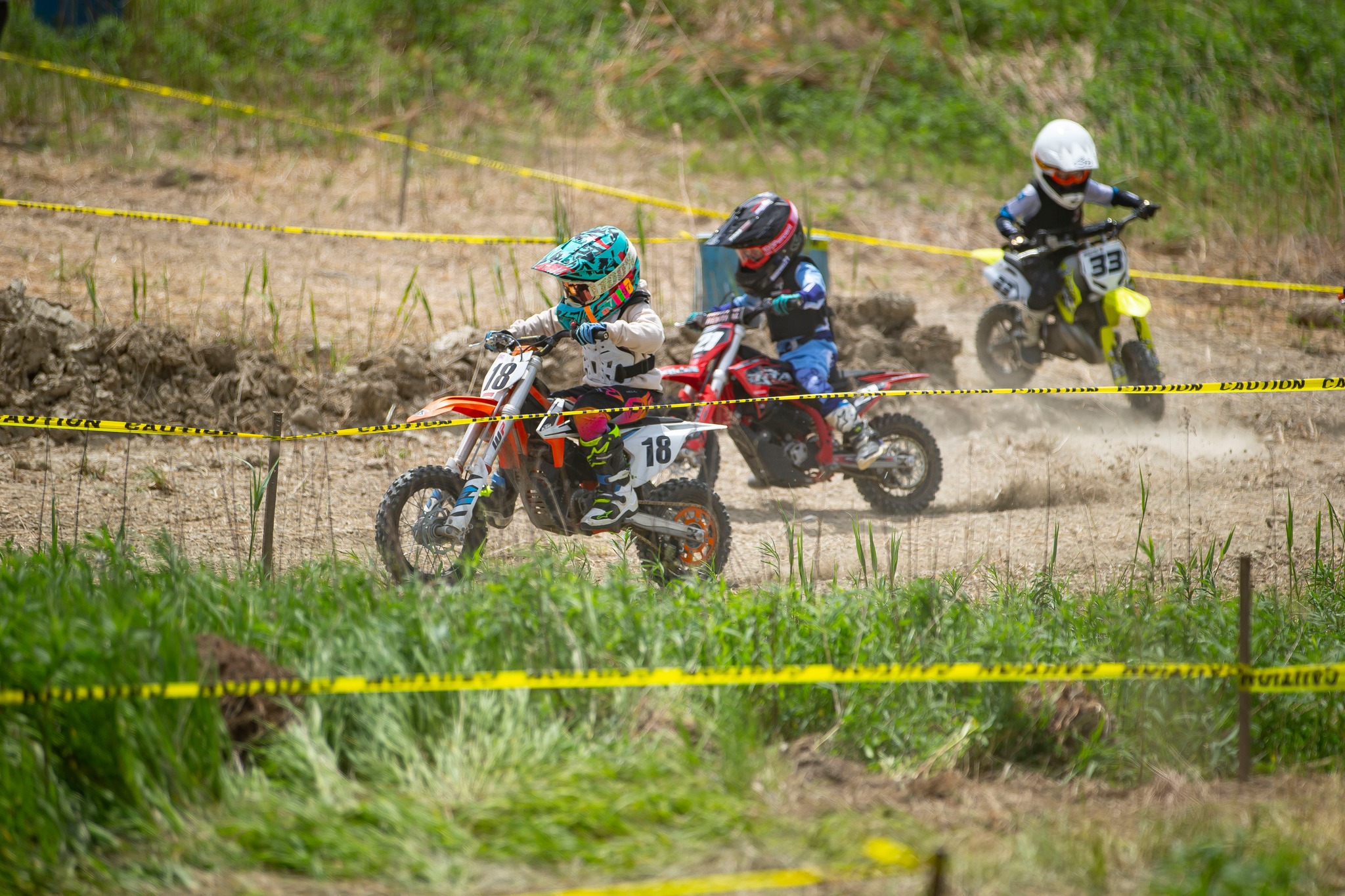 May be an image of 3 people, motorcycle, dirt bike and text